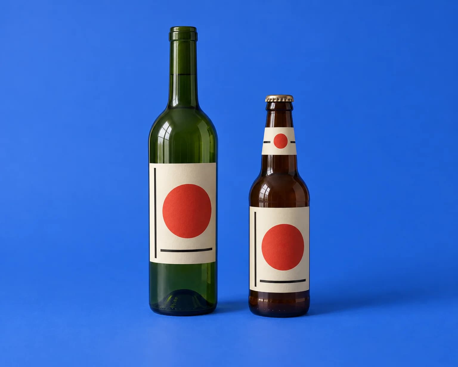 A green wine bottle and a brown beer bottle, each with a cream label with a red circle and black bars, on a blue backdrop